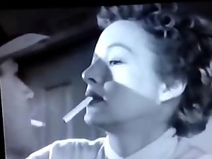 Mother lights sexy cig off son's